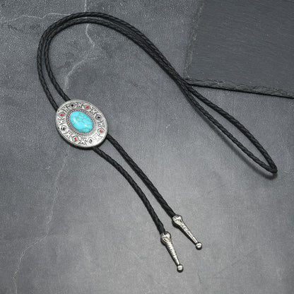 Western bolo tie ornate engraved silver pendant with turquoise stone