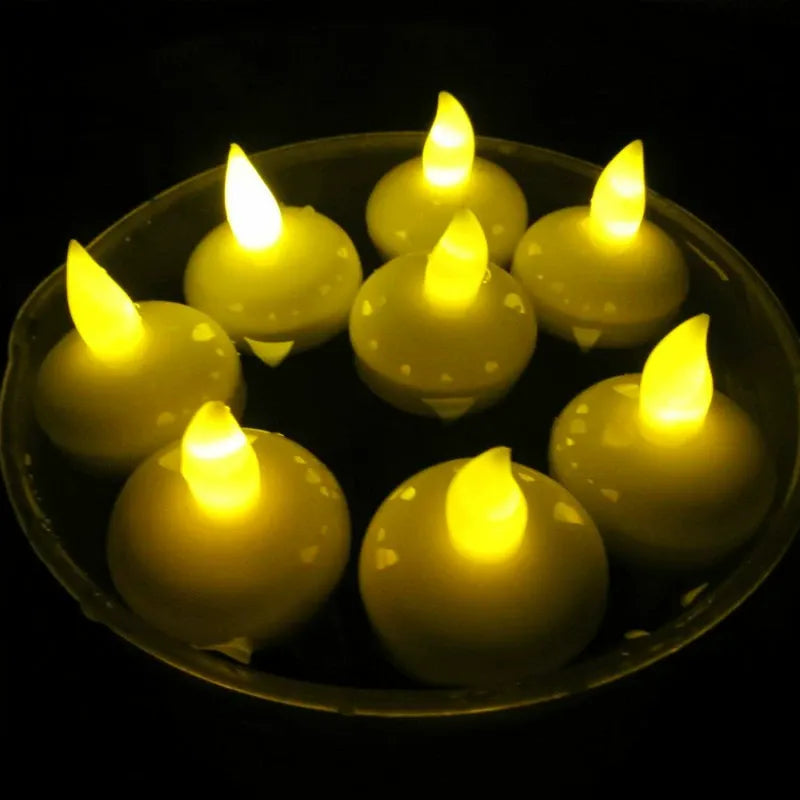 Floating LED candle flickering amber yellow light