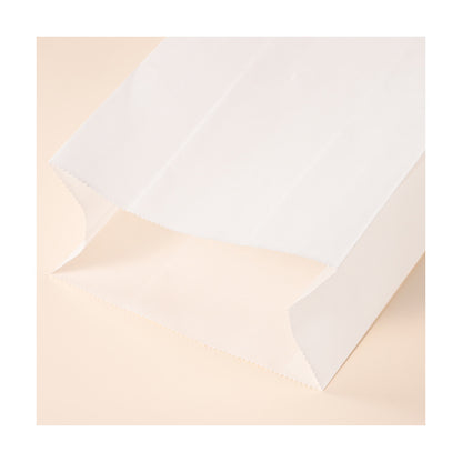 White kraft bag close-up detail of reinforced flat block bottom construction