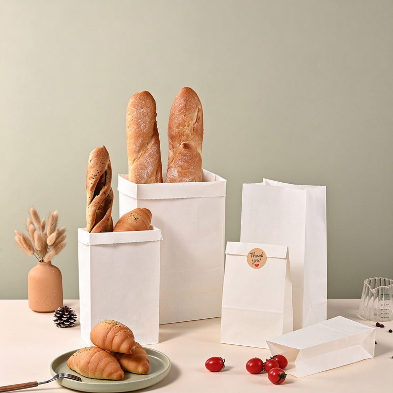 White kraft bag commercial bakery display showing assorted bag sizes in use