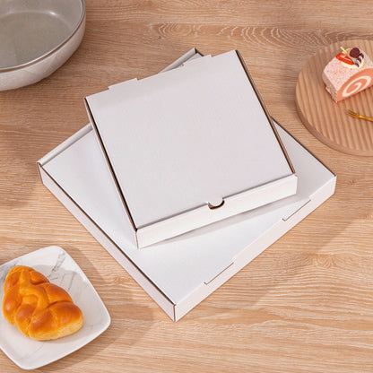 Corrugated pizza box small and large white boxes stacked for size comparison