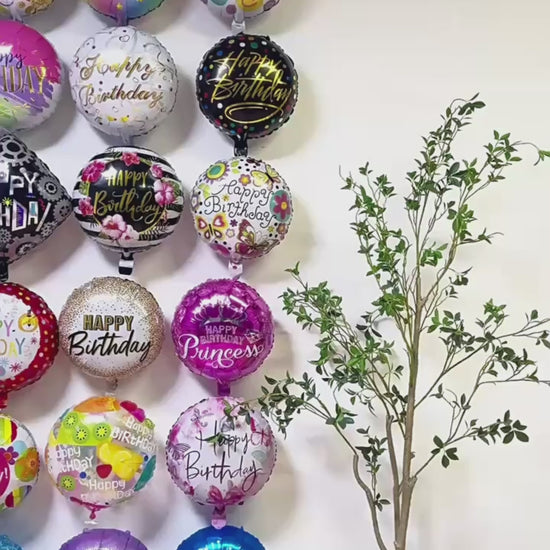 Video showing 18-inch round birthday foil balloon designs and inflated appearance