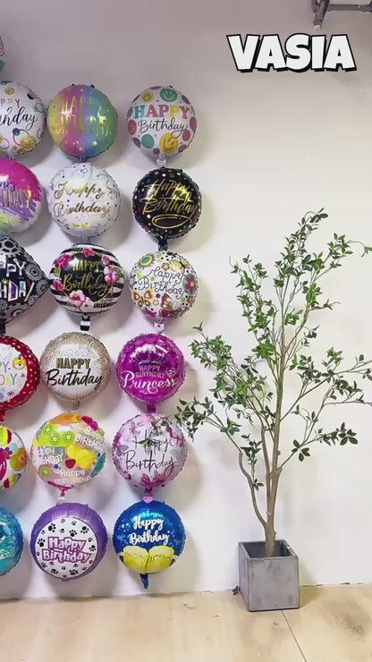 Video showing 18-inch round birthday foil balloon designs and inflated appearance
