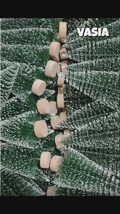 Video showing frosted mini artificial Christmas trees