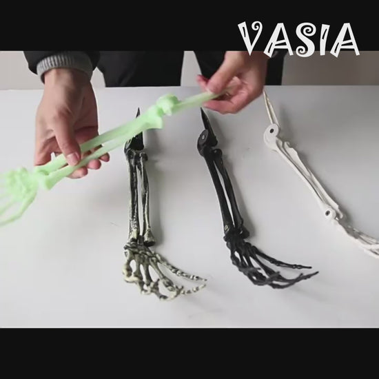 Video showing Halloween skeleton hand prop colors and left-right pair designs