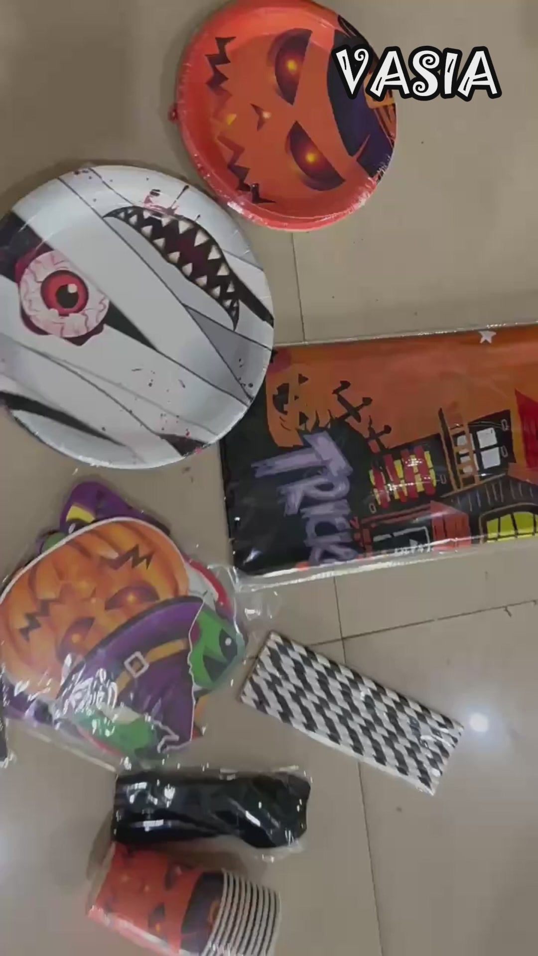Video showing Halloween horror tableware, table covers and hanging decoration options