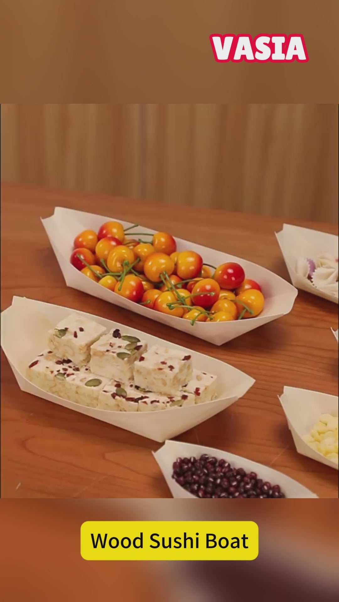 Video showing wooden boat-shaped serving trays