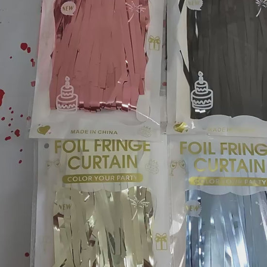 Video showing metallic tinsel fringe curtain colors, sizes and shimmering effect