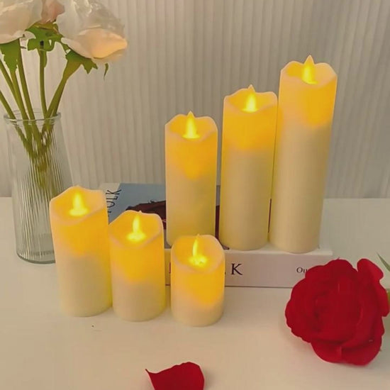 Video showing LED flameless pillar candles with flickering and swaying flame effects