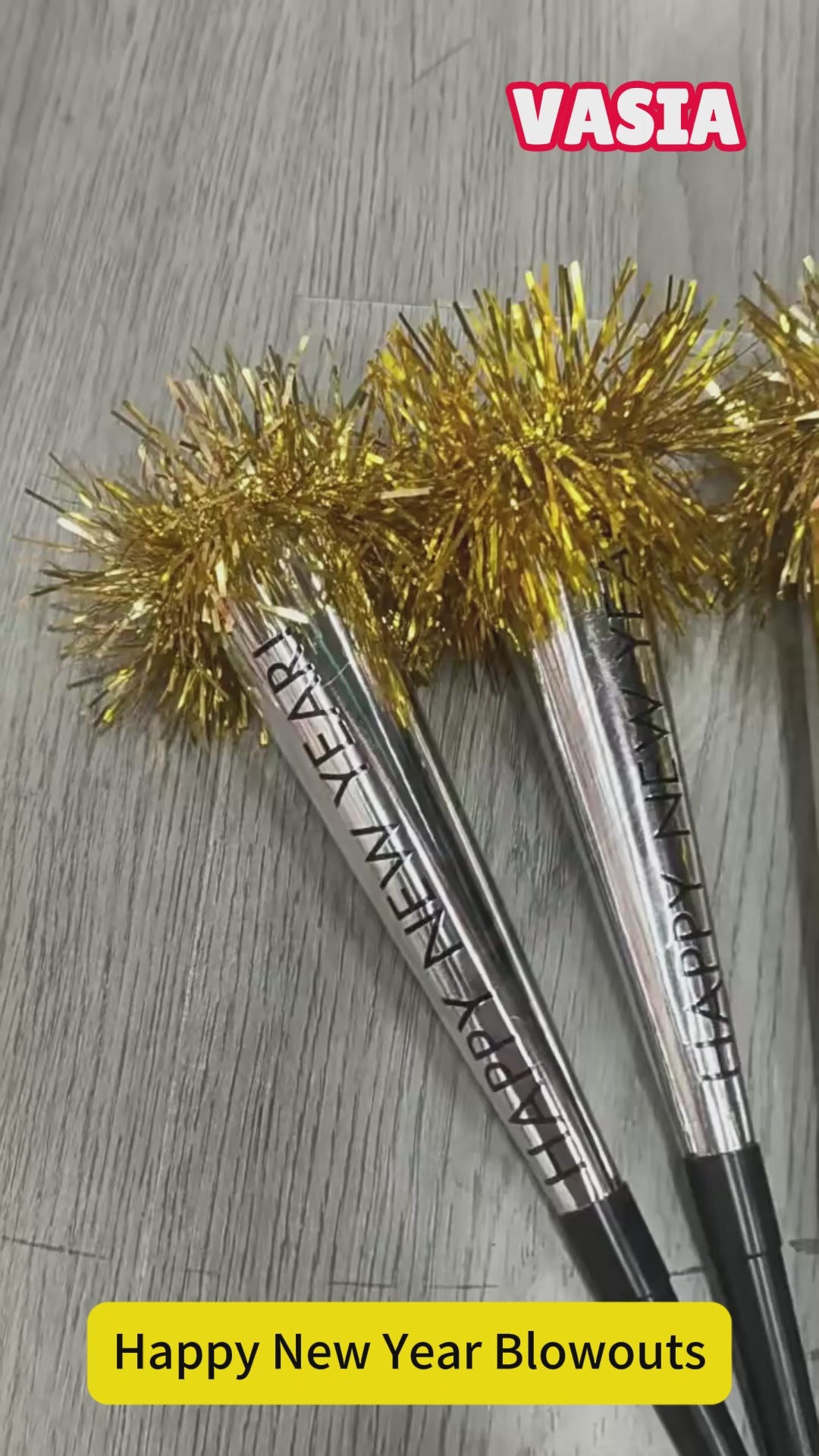 Video showing Happy New Year tassel blowouts being used as party noisemakers