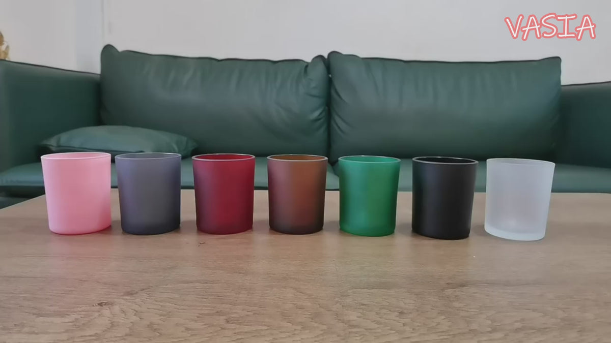 Video showing colored glass candle jars