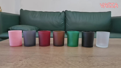 Video showing colored glass candle jars