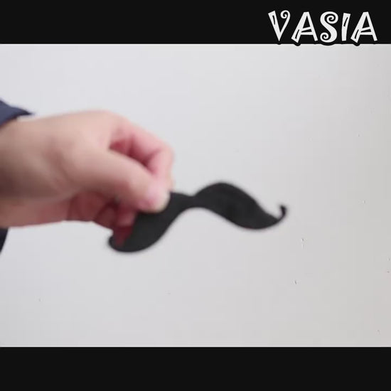 Video showing assorted costume mustaches, beards and facial-hair sets