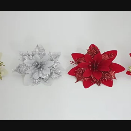 Video showing artificial poinsettia flower heads in holiday colors