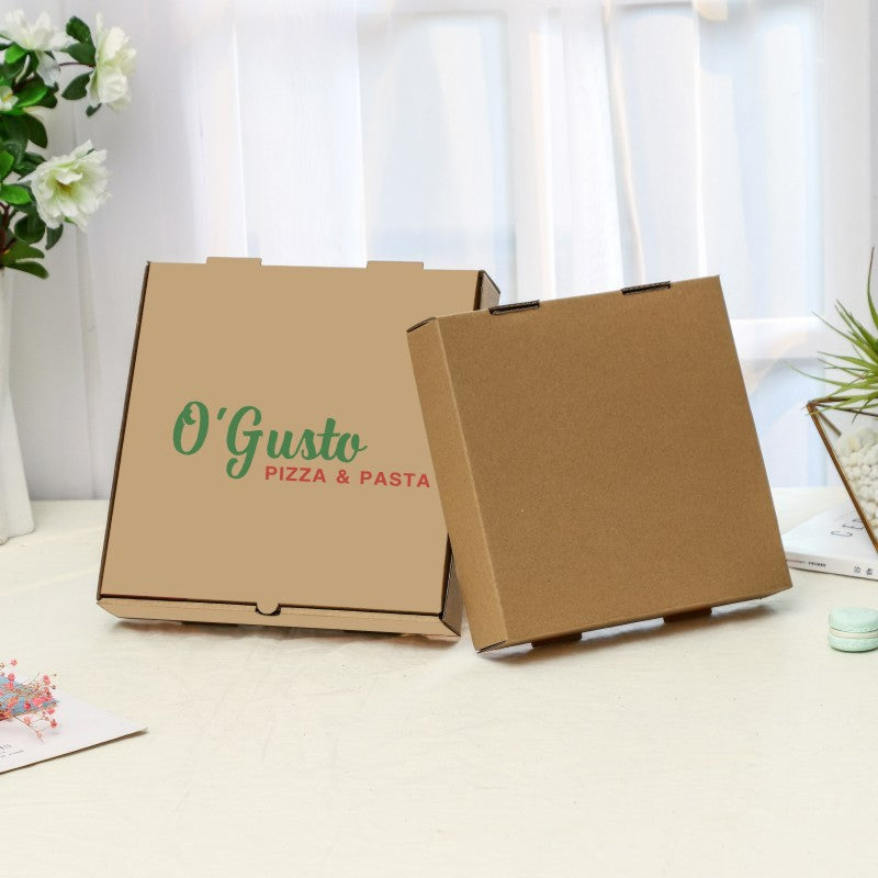 Pizza boxes with green printed exterior, shown flat and open