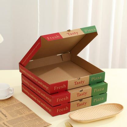 Pizza boxes stacked with lids open for takeaway use